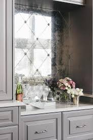 For example, the vilna argenta antique mirror tile gives a dramatic flair to backsplashes. Antiqued Mirror Bar Backsplash Design Ideas