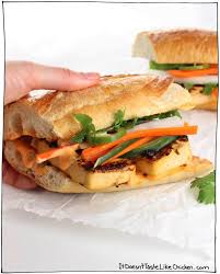 Bánh mì vietnamese sandwiches are prepared with thinly sliced pickled carrots, daikon, green onions, cucumbers, cilantro, and a variety of meats. Grilled Tofu Banh Mi It Doesn T Taste Like Chicken