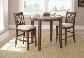 It's crafted from a mix of solid and engineered wood in a light brown and espresso hue that blends in easily with any color palette. Counter Height Round Dining Table Ideas On Foter