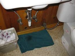 leaking pipe underneath bathroom sink
