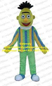 Cartoon character with yellow hair. Pretty Yellow Bert Teenager Sesame Street Mascot Costume Cartoon Character With Erect Black Hair Yellow Globe Nose No 4794 Bert Mascot Costumes Character Mascot Costumescharacter Costumes Aliexpress