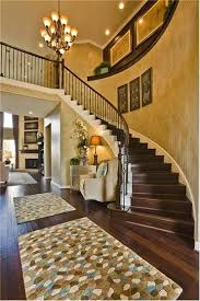 Love The Curved Staircase And Sitting Area At The Base Of It Really Elegant Www Taylormorrison Com Staircase Decor Curved Staircase Staircase Design