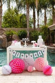 Pool water and pink flamingo punch party drinks. When To Bring A Hostess Gift This Summer Domino Flamingo Pool Parties Pool Party Themes Summer Pool Party