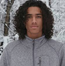 It starts a bit longer on the top and continues with a subtle gradient until it reaches the fully shaven part at the back of your neck. Top 21 Stylish Curly Long Hairstyles For Men Best Hairstyles For Curly Long Hair