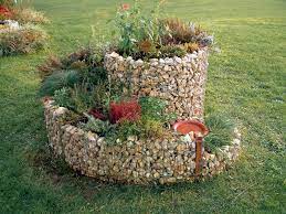 Maybe you would like to learn more about one of these? How To Build A Spiral Herb Garden Spiral Garden Design Plants And Plans Spiral Garden Garden Planning Herb Spiral
