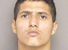 Vehicle crashes into TLC Insurance building