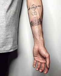Minimalist Mountains Tattoo On The Left Forearm By Sasha Tattooing Mountain Tattoo Tattoos Around Arm Tattoo