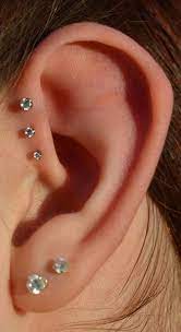 14 Cute And Beautiful Ear Piercing Ideas For Women Biseyre Cute Ear Piercings Swarovski Earrings Studs Ear Piercings Helix