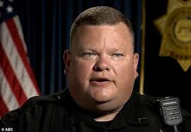 Cop tells of moment that he rescued baby in a shopping bag but sisters  almost mistook her for a cat