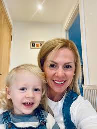 Can someone put us in Christmas pajamas, with a cute Christmas background,  and remove the hat