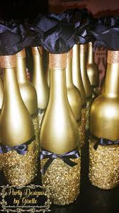 Diy Black Gold Centerpieces Spray Painted Wine Bottles Mod Podge Bottom Half Wine Bottle Centerpieces Black And Gold Centerpieces Spray Painted Wine Bottles