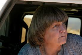 In a charred moonscape, a band of hopeful workers try to save the Joshua  tree