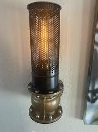 If pgt connectors can be used to hold cylindrical pipes, why couldn't they hold round vases? Pipe Wall Sconce Eccentric Industrial