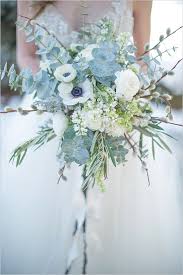 Fill your bridal bouquet with softly blue flowers for a subtle something blue idea. Fresh New Blue Wedding Bouquets We Adore