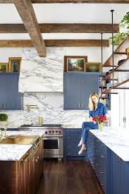 Brooklyn Decker S Eclectic Texas Home Turns On The Southern Charm Celebrity Houses Blue Shaker Kitchen Chic Kitchen
