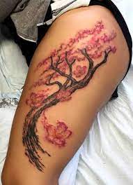 45 Elegant Cherry Blossom Tattoo Designs Of 2020 Tree Thigh Tattoo Thigh Tattoo Designs Thigh Tattoos Women