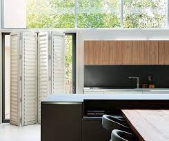 If placing faux wood shutters above the kitchen sink, high arching faucets may block one or both of the doors from opening. Style Your Kitchen With Plantation Shutters Sa Decor Design