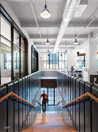 It S A Bit Ironic That Fitness Centers Tend Not To Have The Greatest Physique Themselves The Interior Design School Gym Architecture Lighting Design Interior