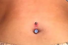 Is My Bellybutton Piercing Rejected Or Just Healing I Got It Re Pierced 5 Days Ago And It Was Through Scar Tissue As It Rejected The Previous Time Piercing
