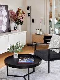 In the living room, she spent $29 on the kmart coffee table, $12 on a white cushion from kmart, $59 on a cowhide ottoman, $9 on flowers from freedom, $149 (instead of $249) on a gold hammer side. Kmart Australia Offers Sneak Peek At Its New August Living Range Daily Mail Online