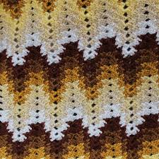 Snuggling under this ripple afghan on a chilly night is the best thing next to making it. Grandma Spiked Crochet Ripple Blanket Pattern