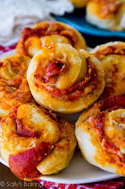 On a lightly floured surface, roll out the pizza dough to a rectangle of approximately 9 x 16 inches. Pepperoni Pizza Rolls These Fun Little Rolls Are Made With My Tested Pizza Dough Recipe They Re The Perfect Crowd Please Party Best Of Pinterest Pepperoni Pizza Rolls Pizza Recipes