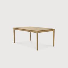 This coffee to dining table is one of a kind expanding table with many space saving features! Oak Bok Extendable Dining Table