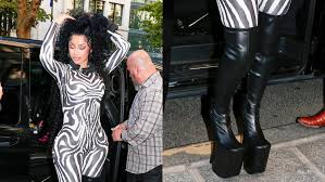 Cardi B Embraces Sky-high Drama With Sculptural Boots at Jean Paul Gaultier Show