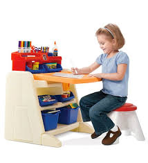 This nifty art cabinet's door folds down to become an art table, with a sturdy picture frame acting as the legs. 15 Kids Art Tables And Desks For Little Picassos Home Design Lover