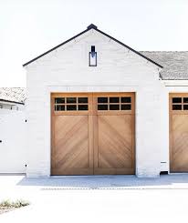 Fixer Upper Our 1987 Home Makeover Begins The Exterior Modern Farmhouse Exterior Farmhouse Style House Garage Door Design