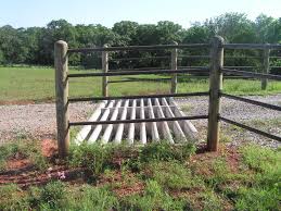 This one walks right through it despite the ropes we have across it. Cattle Guard Build Tractorbynet