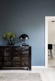 Colour Is Briefly Introduced In The Living Room Which Has A Slate Blue Feature Wall And M Feature Wall Living Room Feature Wall Bedroom Blue Walls Living Room