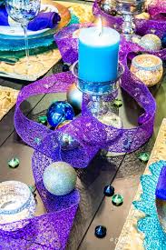 Peacock centerpiece,peacock candle holder,peacock candle surround,peacock party decor,peacock decor,blue green decor. Peacock Tablescape Entertaining Diva From House To Home
