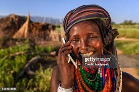 168 Woman With Cell Phone In African Village Stock Photos, High-Res  Pictures, and Images