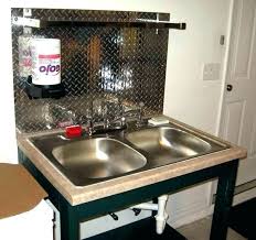 The uniquely designed laundry/utility sink cabinet integrates seamlessly into many spaces, with its classic finishing look and durable components, offering ease of convenience, specifically for a laundry room, workshop, basement, or garage. Garage Utility Sink Ideas Ecsac