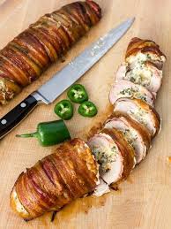 Place in the oven and cook to medium doneness about 8 to 10 minutes. Jalapeno Popper Stuffed Smoked Pork Tenderloin Wrapped In Bacon Smoked Pork Tenderloin Smoked Food Recipes Smoked Pork