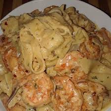 I have never tried it with cream before but use half a glass of white wine and a squirt of tomato paste to the prawns whilst cooking. Creamy Shrimp Fettuccine Pasta With Homemade Alfredo Sauce With Fettuccine Pasta Shrimp Oil Small Onio Seafood Recipes Recipes Alfredo Sauce Recipe Homemade