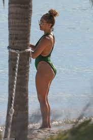 she has never been happier and knows it was meant to be. Jennifer Lopez Wows In Slinky Emerald Swimsuit As Alex Rodriguez Is Branded A Serial Cheater Daily Mail Online
