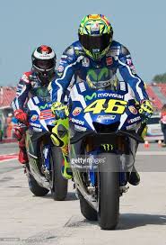 Valentino Rossi 46 And Jorge Lorenzo 99 Of Movistar Yamaha Motogp Team Are Seen On The Pit Lane During Motogp Of Valentino Rossi 46 Motogp Rossi Rossi Moto