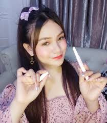 Makeup vanity made from old suitcase with ash and pink