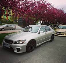 cherryblossoms kwitnacawisnia spring car lexus lexusis300 altezza sxe10 jdm japan goldcar cherryblossoms kwitnacawisnia spring jdm lexus bmw car jdm lexus
