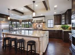 From light hardwood to patterned tile, this hue can work with a variety of styles. 30 Classy Projects With Dark Kitchen Cabinets Luxury Home Remodeling Sebring Design Build