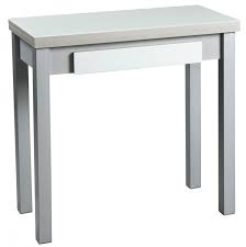Delante de la chimenea hay tres sillones. Mesa Extensible Confor Libro Conforama