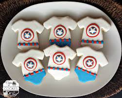 Baby Shower Captain America Onesies Cookies Www Cakesandcookiesbyclau Com Baby Shower Cookies Marvel Baby Shower Baby Shower Cakes