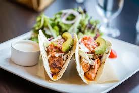 Coat the fish pieces lightly in flour, then dip into the batter, allowing the excess to drip back into the bowl. Fish Tacos Served On Flour Tortillas With Cabbage Pico De Gallo And Avocado Picture Of Fusion Restaurant Lounge Virginia Beach Tripadvisor
