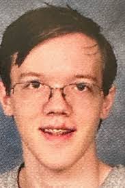 Gunman had photos of Trump, Biden and other US officials