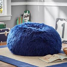Versatile use bean bag foram chair provides extra seating with a modern look that can fit into any rooms always a joy our bean bag foam arm chair is suitable for different kinds of activities: Himalayan Faux Fur Navy Bean Bag Chair Pottery Barn Teen