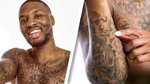 Bradley beal é cercado por todo o time dos blazers, mas mostra visão de quadra e acha. Watch Damian Lillard Breaks Down His Tattoos Tattoo Tour Gq