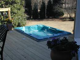 A nice hot tub or jacuzzi for those who no longer need to worry about zombies and creepers invading their houses. A Hot Tub Deck In Centerville Ga Quickly Becomes The Center Of Attention In This Backyard Archadeck Of Central Ga