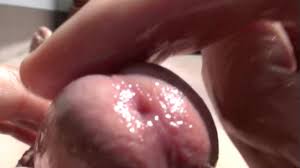 Массаж головки крупным планом (эротическое искусство)